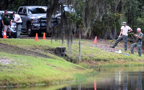 Mulher foi arrastada para o lago e morreu FOTO Drew Martin AP